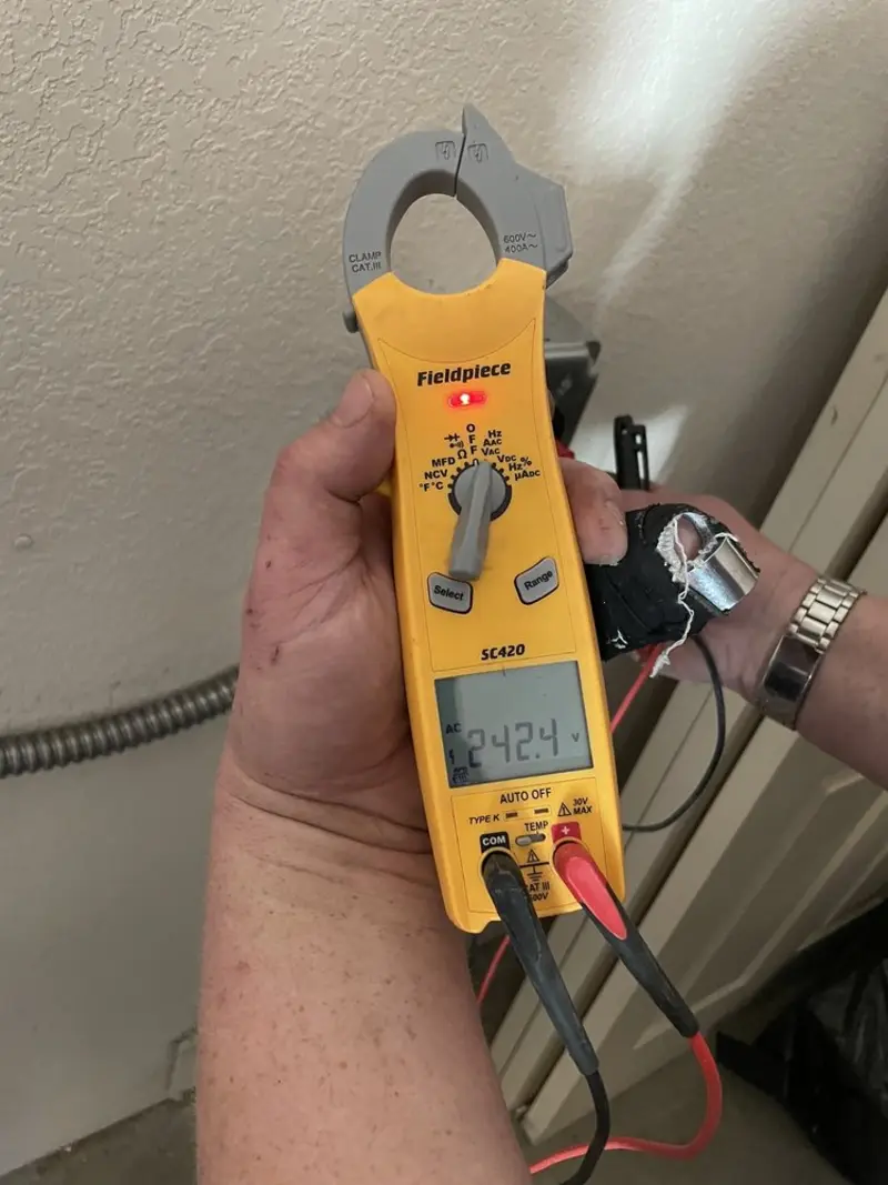 Voltage testing with clamp meter during Electrical Installation Services in Loomis